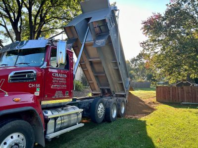 Dump Truck Dumping Dirt